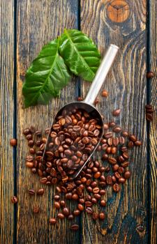 coffee beans on a table, aromatic coffee beans, coffee background