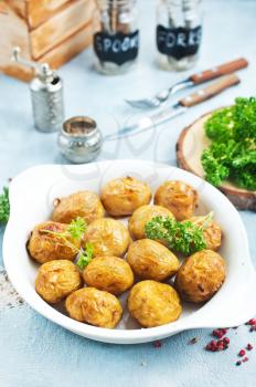 Tasty boiled potatoes, potato with butter dill parsley