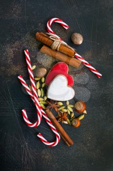 christmas background, christmas cookie and candycane on a table