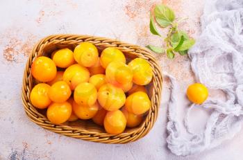 fresh plums on a table, stock photo