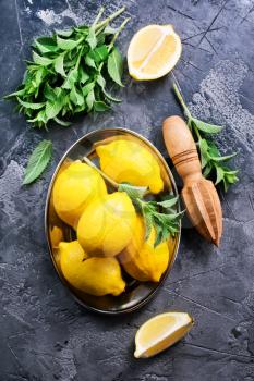 ingredients for lemonad, lemons and fresh mint