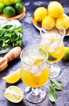 lemonad in glasses and on a table