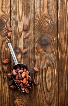 cocoa beans on a table, stock photo