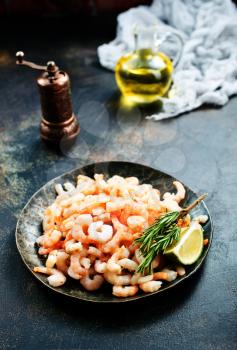 boiled shrimps with pepper and salt on plate