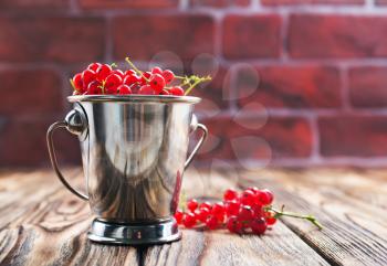 red currant on the wooden table,stock photo