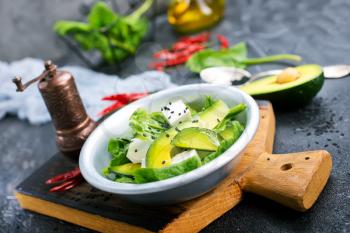 avocado with feta cheese and with aroma herbal spice 