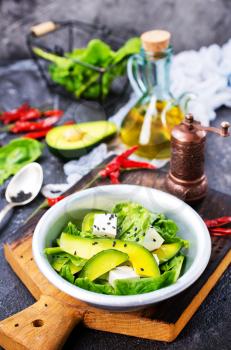 avocado with feta cheese and with aroma herbal spice 