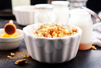 yogurt with granola on a table, stock photo