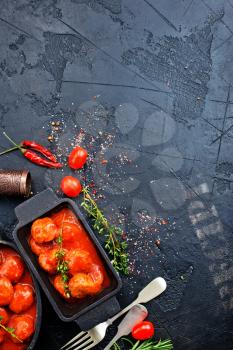 meatballs with tomato sauce in bowl, stock photo
