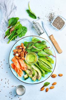Healthy food antioxidant products: fish and avocado, nuts and fish oil