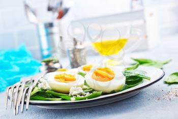 salad with boiled eggs on plate, stock photo
