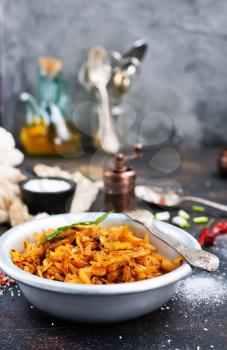 fried cabbage with tomato sauce, stock photo