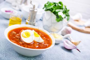beet soup with boiled egg, fresh soup