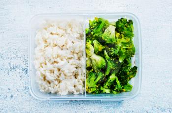 boiled rice and broccoli in lunch box