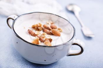 sour cream with sugar and nuts, desert with nuts