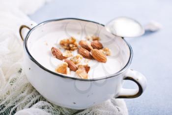 sour cream with sugar and nuts, desert with nuts