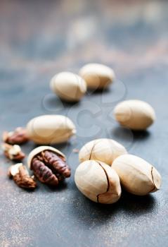 Pecan nuts on a table, pecan nuts in shell