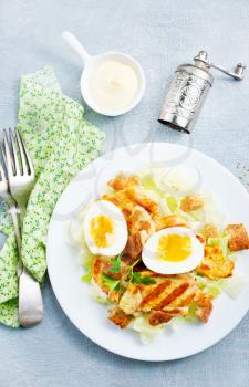 salad with fried chicken and boiled eggs