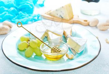 cheese with grape honey, cheese with nuts and honey