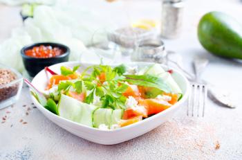 Fresh green  salad with smoked salmon and cherry tomatoes