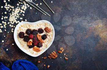 porridge with Chia and oat flakes in bowl