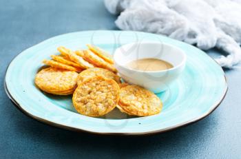 Rice crackers with peanut butter, rice chips with sauce