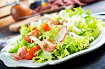 fresh vegetable salad on plate on a table