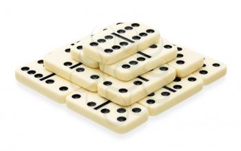 Domino building in the shape of pyramid on white background