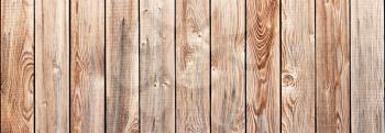 Old rustic grange scratched wooden fence background closeup view horizontaly seamless