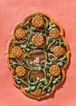 Ornate ceramic decoration on a wall of the Forbidden City - Beijing, China