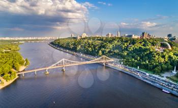 Aerial view of the Dnieper river with the Pedestrian Bridge in Kiev, Ukraine