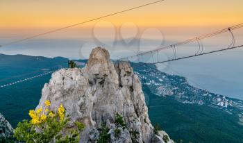 Rope bridges and a cross at Ai-Petri, a peak in the Crimean Mountains