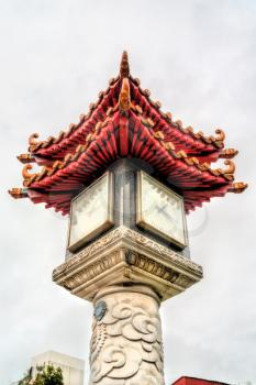 Clock in traditional Chinese style at Mengjia Longshan Temple, a Chinese folk religious temple in Taipei, Taiwan