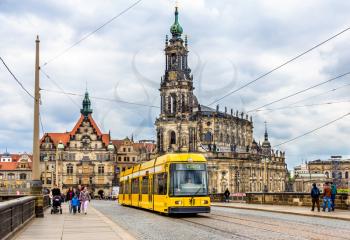 Dresden, Germany - May 04, 2014: Cathedral of the Holy Trinity and a tram. Dresden is the capital of Saxony.