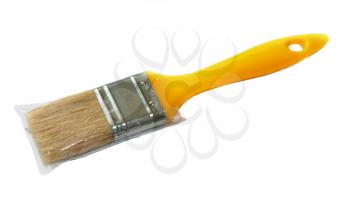 Brush for paint with yellow handle in the packaget  isolated on white background