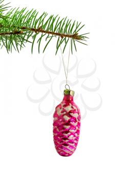 Christmas tree branch with a toy isolated on white background