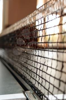 Defocused grid table tennis against the window