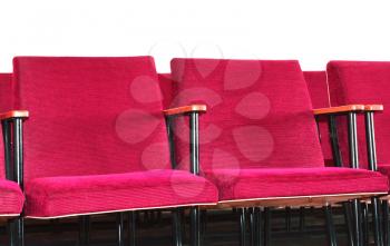 Red soft spectator armchair on a white background