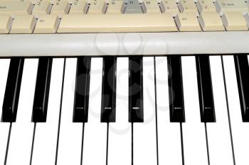 Parts of computer and music keyboards close-up