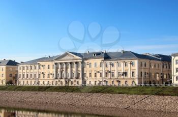 View of an old building in the Vologda city, Russia. Riverside at morning