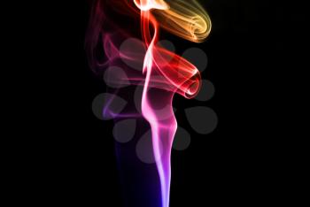 Abstract beautiful colorful smoke on black background.