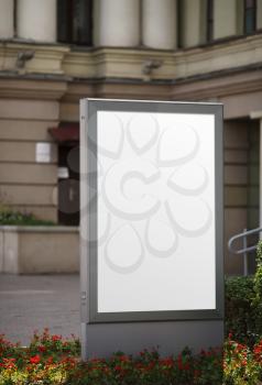 Blank vertical billboard. Clipping path. Shallow depth of field.