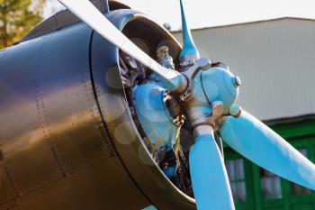 Aircraft propeller and engine close-up. Vintage plane. Old retro plane close-up. Selective focus.