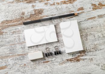 Blank stationery set. Mockup for your design. Responsive design template. Bank business cards, pencil, eraser, badge and sharpener. Top view.