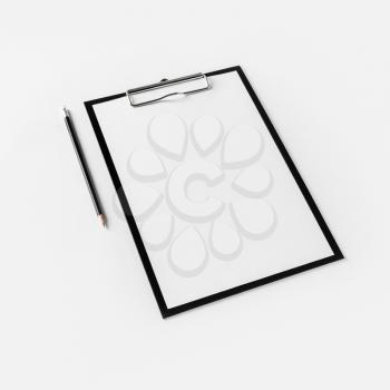 Clipboard with blank letterhead and pencil on white paper background.