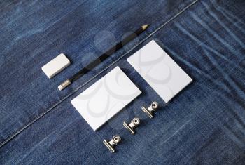 Photo of blank stationery set on denim background. Corporate identity mock up for placing your design.