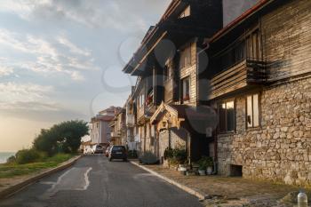 Nesebar, Bulgaria - September 05, 2014: Seaside resort and ancient old town Nesebar in Bulgaria. Bulgarian Black Sea Coast. Street, ancient architecture and road. Architectural and historic complex. UNESCO world heritage site.