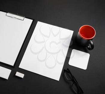 Photo of blank stationery set on black background. Business brand template.