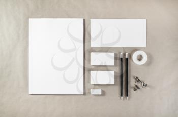 Photo of blank stationery. Corporate identity template on paper background. Mock up for design portfolios. Top view.