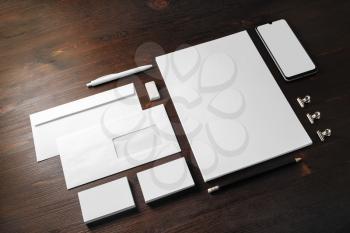 Blank stationery and corporate identity template on wooden background. Responsive design mockup.